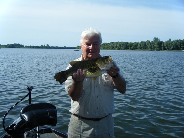 2012 fishing 018.jpg - Rae with another nice Bucketmouth from the Golden Triangle Area.